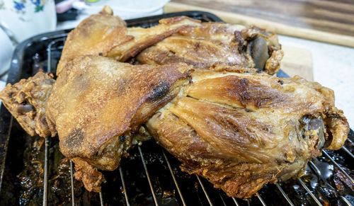 Close-up of meat on barbecue grill.