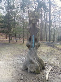 Statue of bare tree