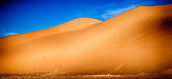 Scenic view of desert against sky