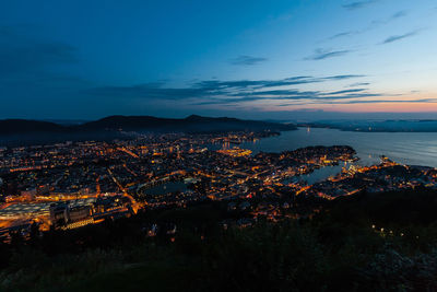 High angle view of illuminated city at night