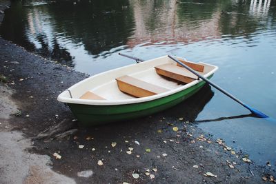 High angle view of boat moored on lakeshore