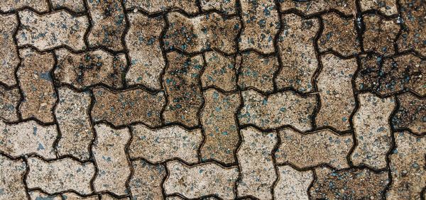 Full frame shot of cracked footpath