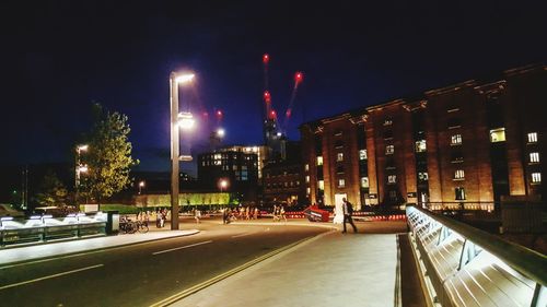 Illuminated street light at night