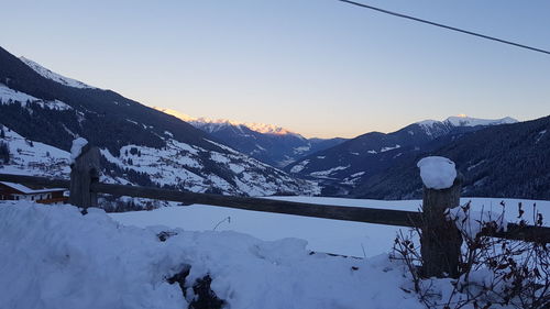 Snow covered mountains against sky