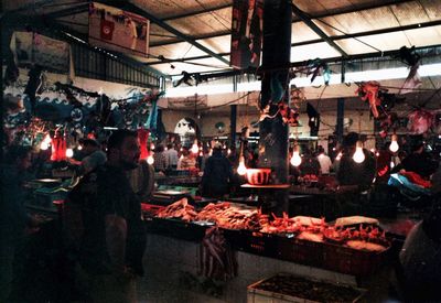 People in market at night