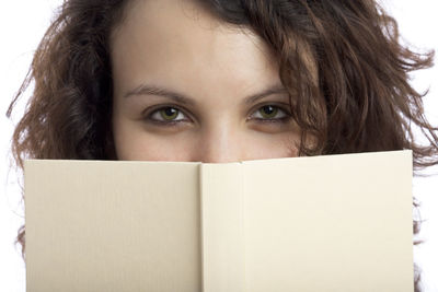 Portrait of woman with open book