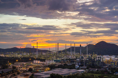 High angle view of buildings against sky during sunset