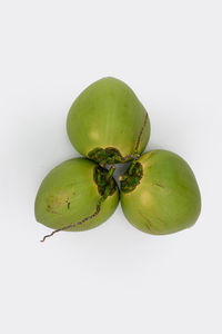 Directly above shot of fruit against white background