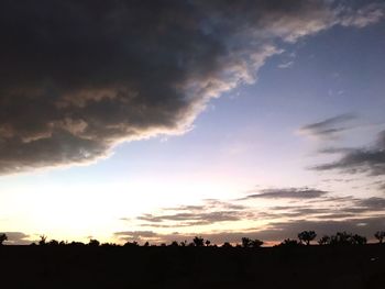 Scenic view of silhouette landscape against sky during sunset