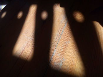 High angle view of shadow on table