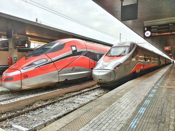 Train on railroad tracks against sky