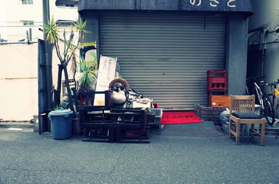 Cars on street by buildings in city