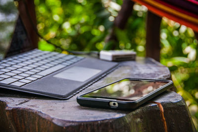 Close-up of mobile phone on table