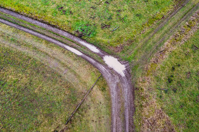 High angle view of road amidst field