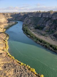 High angle view of river amidst rocks