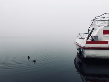 Boat in sea against sky