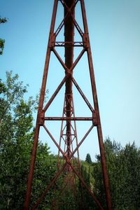 Low angle view of metallic structure against sky
