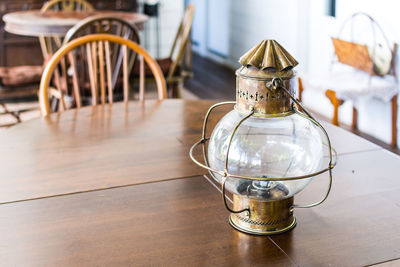 Lantern on wooden table