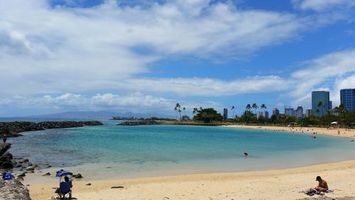 Scenic view of beach and sea against sky