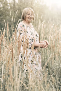 Woman standing on field