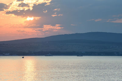 Scenic view of sea against sky during sunset