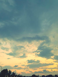 Low angle view of dramatic sky during sunset