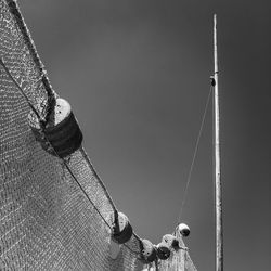 Low section of man fishing