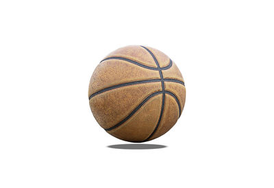 Close-up of basketball hoop against white background