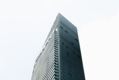 Low angle view of modern building against clear sky