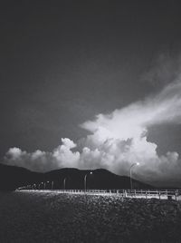 Scenic view of landscape against cloudy sky