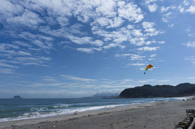Scenic view of beach against sky