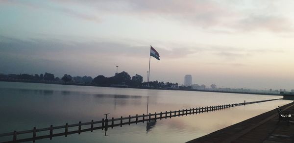 Scenic view of lake against sky during sunset