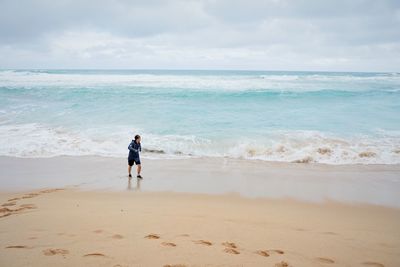 Scenic view of beach and sea against sky