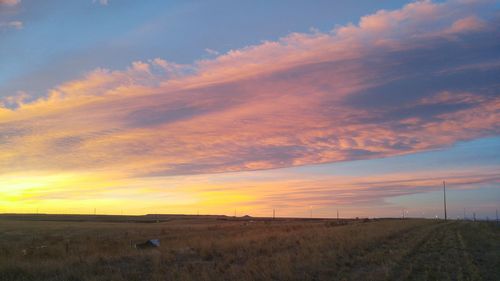 Scenic view of dramatic sky during sunset