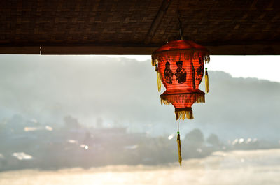 Low angle view of illuminated lantern hanging