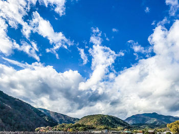 View of mountain range against cloudy sky