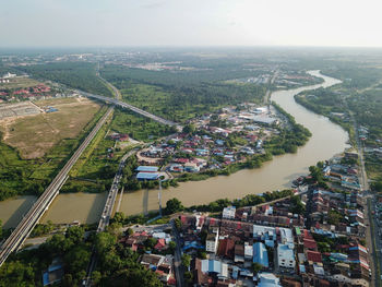 High angle view of buildings in city against sky