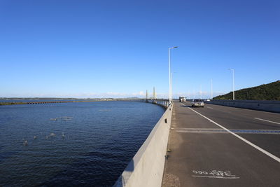 View of road against blue sky