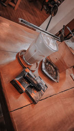High angle view of old equipment on table