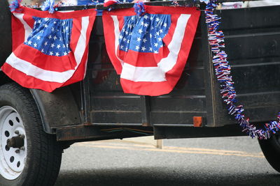 American flag on vehicle trailer during independence day parade