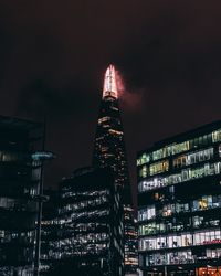 Illuminated buildings in city at night