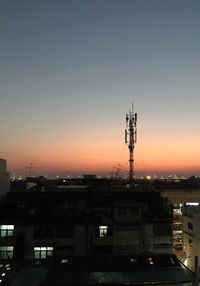 Cityscape against sky during sunset