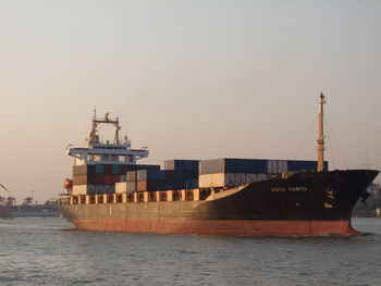 Ship in sea against sky