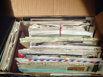 Stack of books in shelf at home