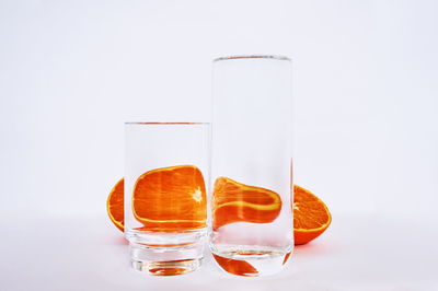 Close-up of beer glass against white background