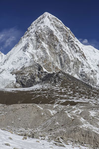 Snowcapped mountains against sky