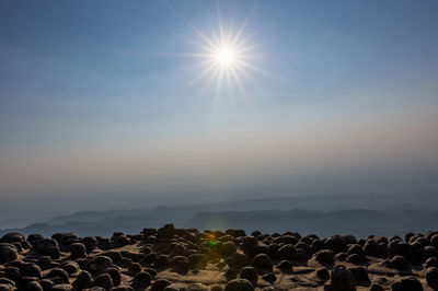 Sun shining through rocks