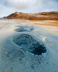Scenic view of mud pots
