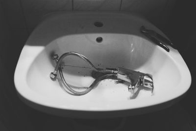 High angle view of eyeglasses on plate