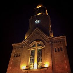 Low angle view of illuminated built structure